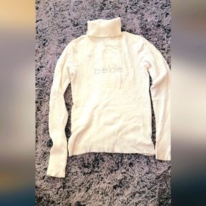 Bebe turtle neck sweater. Size Large